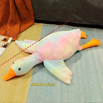 Giant plush duck dog toy size comparison next to dog