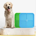 Dog lick mat dog licking peanut butter during bath time calming