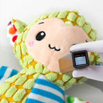 Squeaky plush dog toy reinforced stitching seam detail