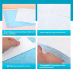 Dog training pads quick-lock tabs keeping pad flat on floor