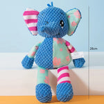 Squeaky plush dog toy dog carrying toy happily in mouth